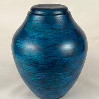 Vase shaped wood turned urn in Ocean Blue finish.
